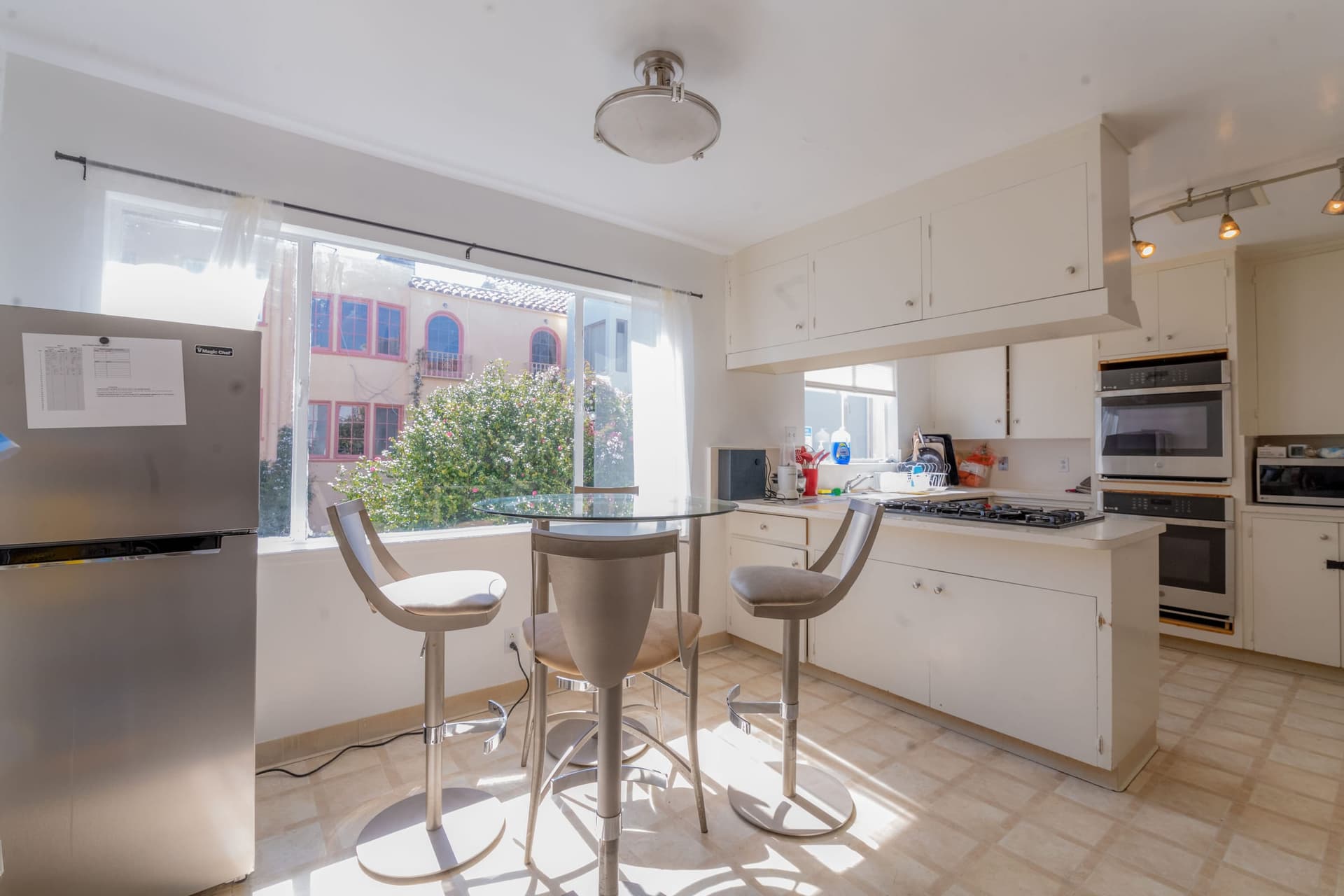 Bright residential kitchen with a breakfast bar
